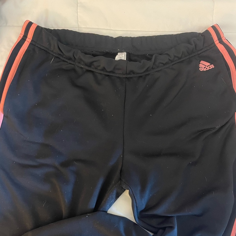 Adidas black with pink stripe sweats.